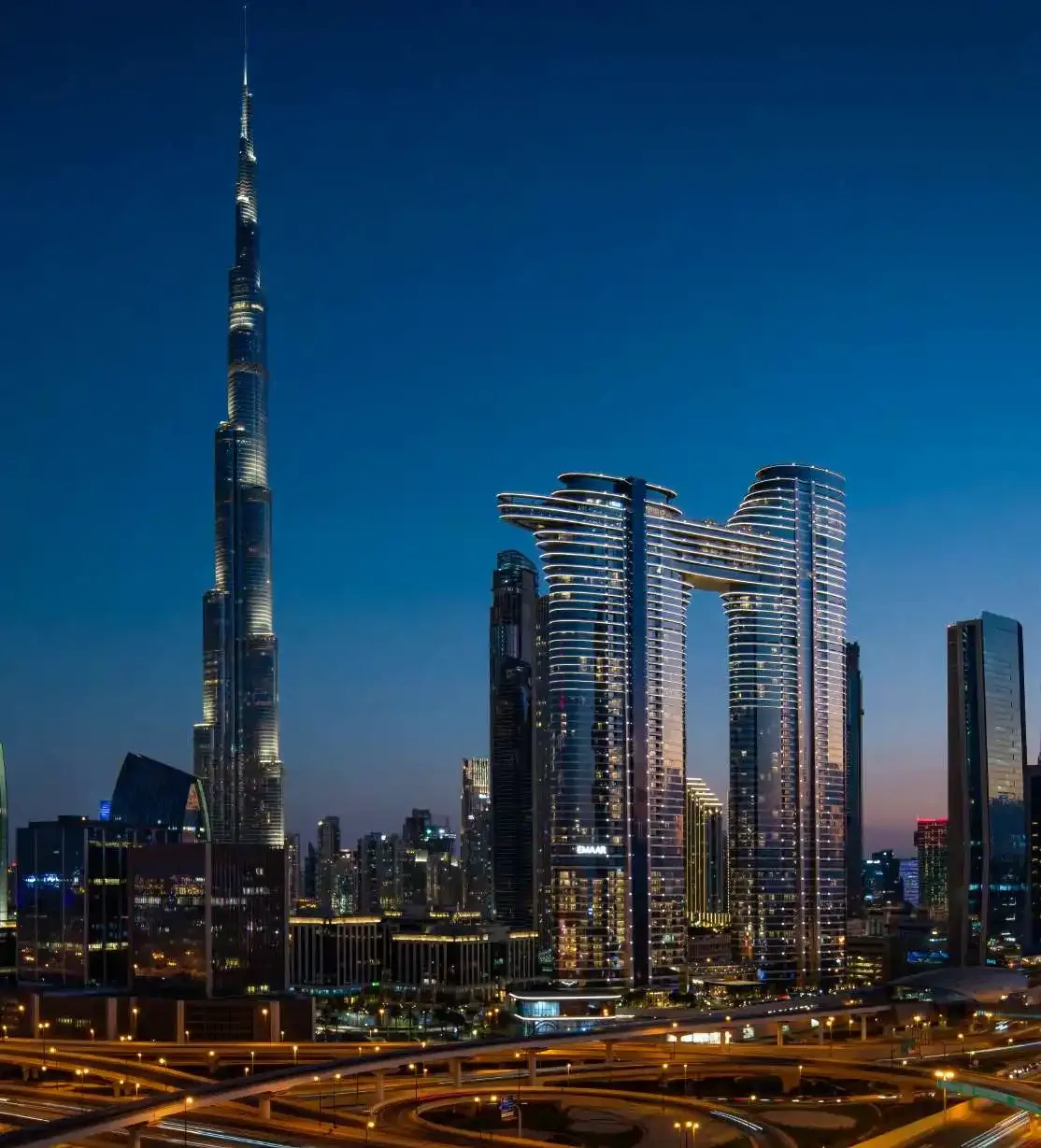 The Dubai skyline at dusk with Burj Khalifa.